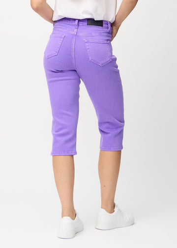 Purple regular capris seen from the back, so the entire product can be seen.