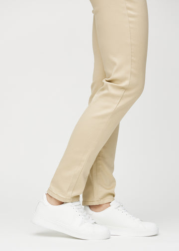 The ankles of a model, so you can see how tightly the jeans fit.