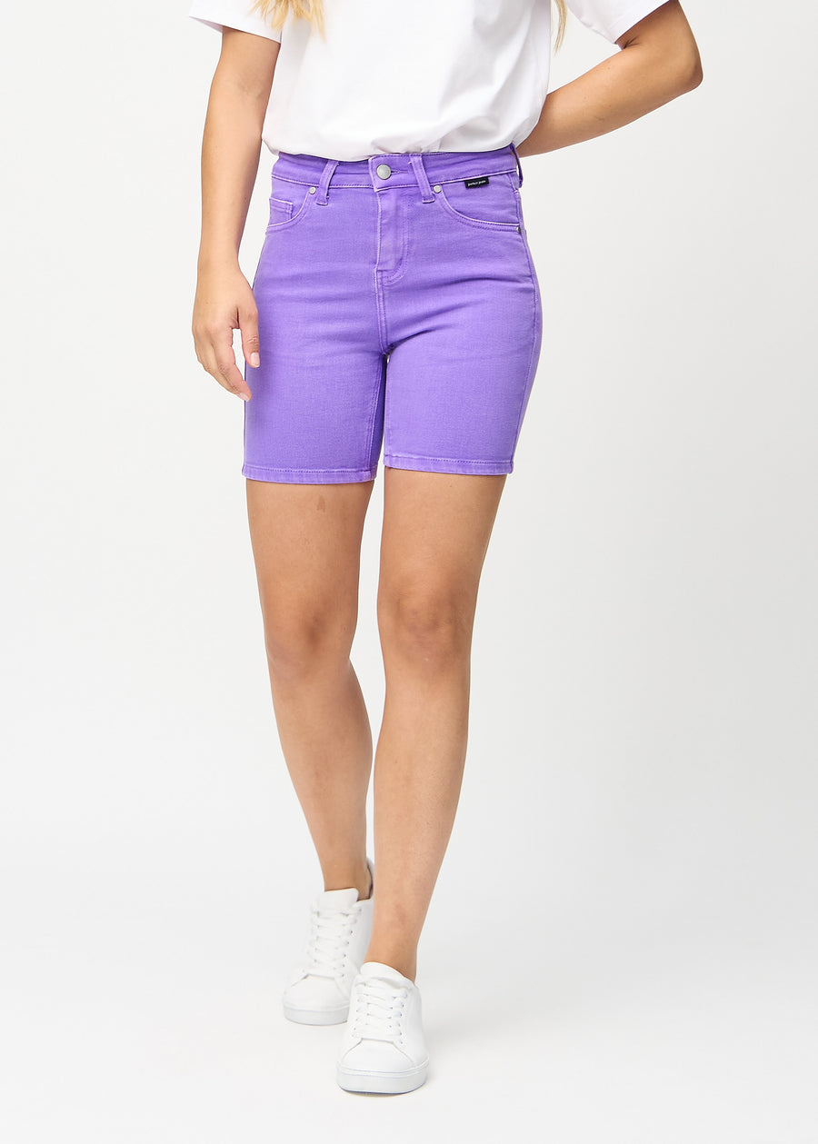 Purple skinny short shorts, style name Lavenders, with a tight fit and ending mid-thigh, seen from the front.