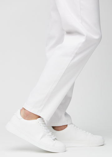 The ankles of a model, so you can see how loose the jeans fit.