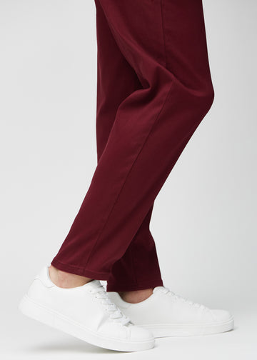 The ankles of a model, so you can see how loose the jeans fit.