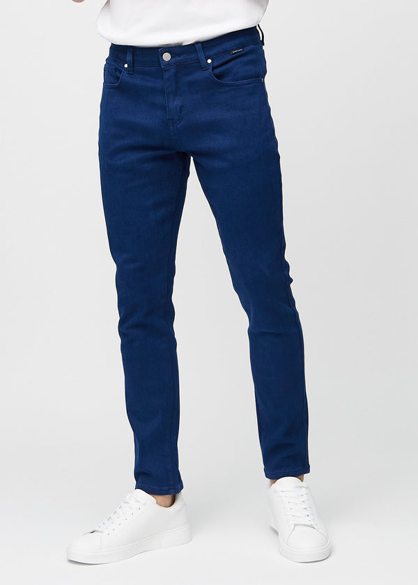 Dark blue slim jeans, model name Royals, fitted closely along the legs, front view.